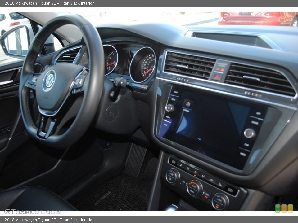 Titan Black Interior Dashboard for the 2018 Volkswagen Tiguan SE #140636310