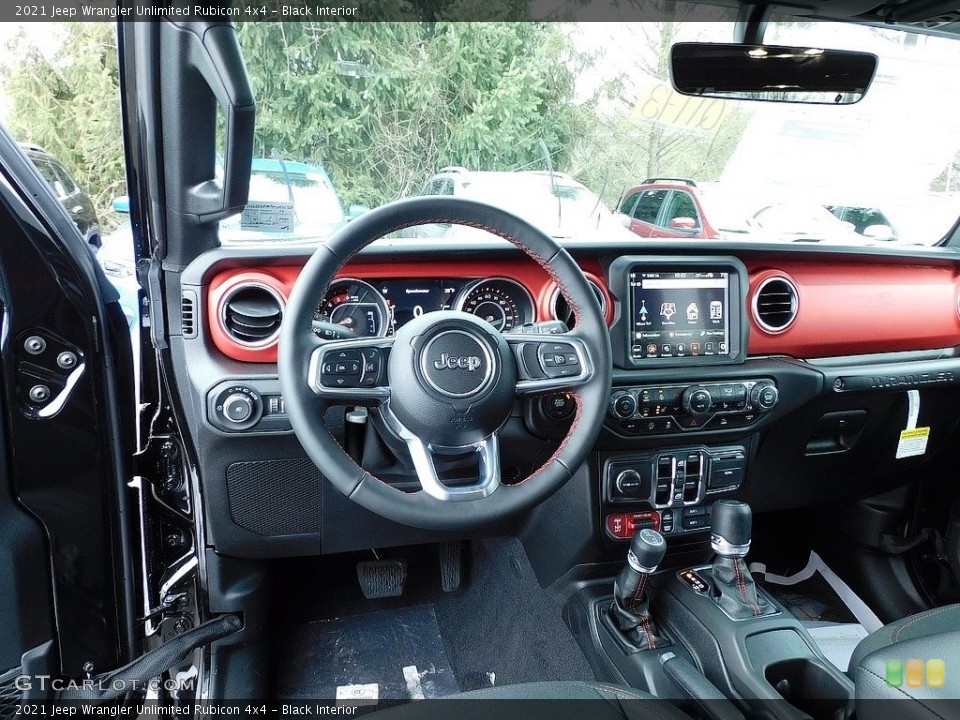 Black Interior Dashboard for the 2021 Jeep Wrangler Unlimited Rubicon 4x4 #140636395