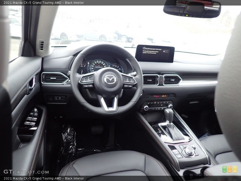 Black Interior Dashboard for the 2021 Mazda CX-5 Grand Touring AWD #140661907