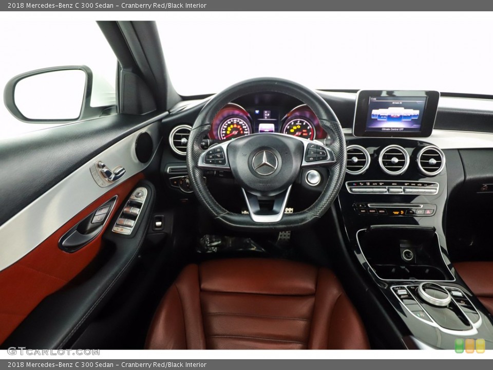 Cranberry Red/Black Interior Dashboard for the 2018 Mercedes-Benz C 300 Sedan #140690775