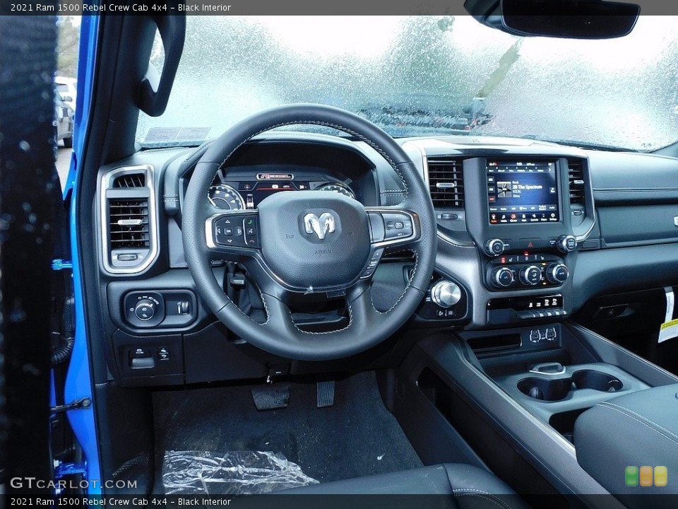 Black Interior Dashboard for the 2021 Ram 1500 Rebel Crew Cab 4x4 #140711552