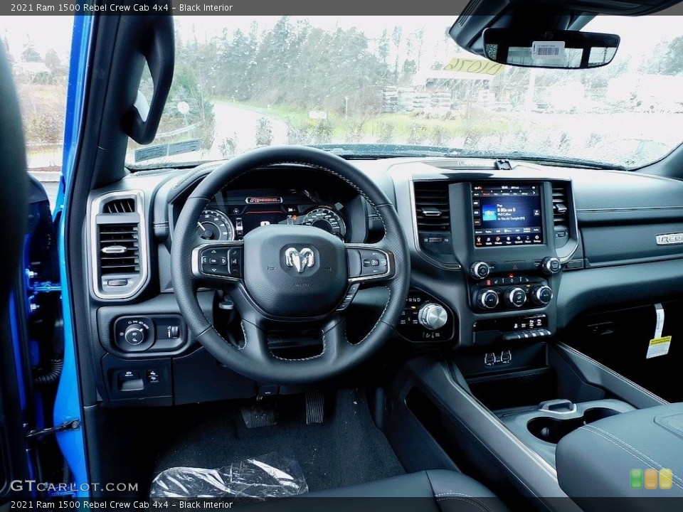 Black Interior Dashboard for the 2021 Ram 1500 Rebel Crew Cab 4x4 #140711837
