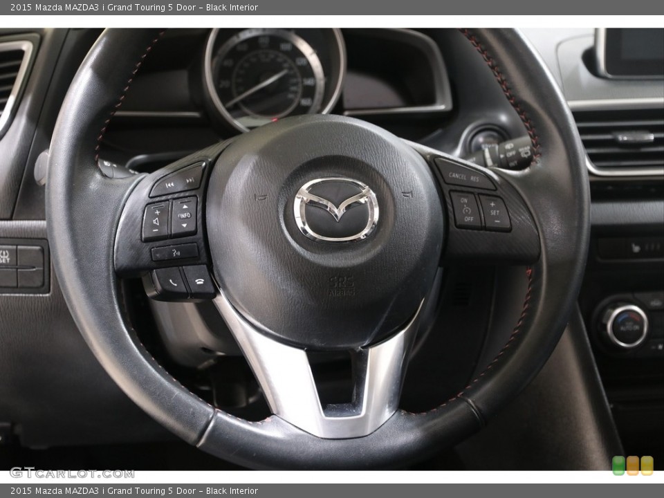 Black Interior Steering Wheel for the 2015 Mazda MAZDA3 i Grand Touring 5 Door #140728173