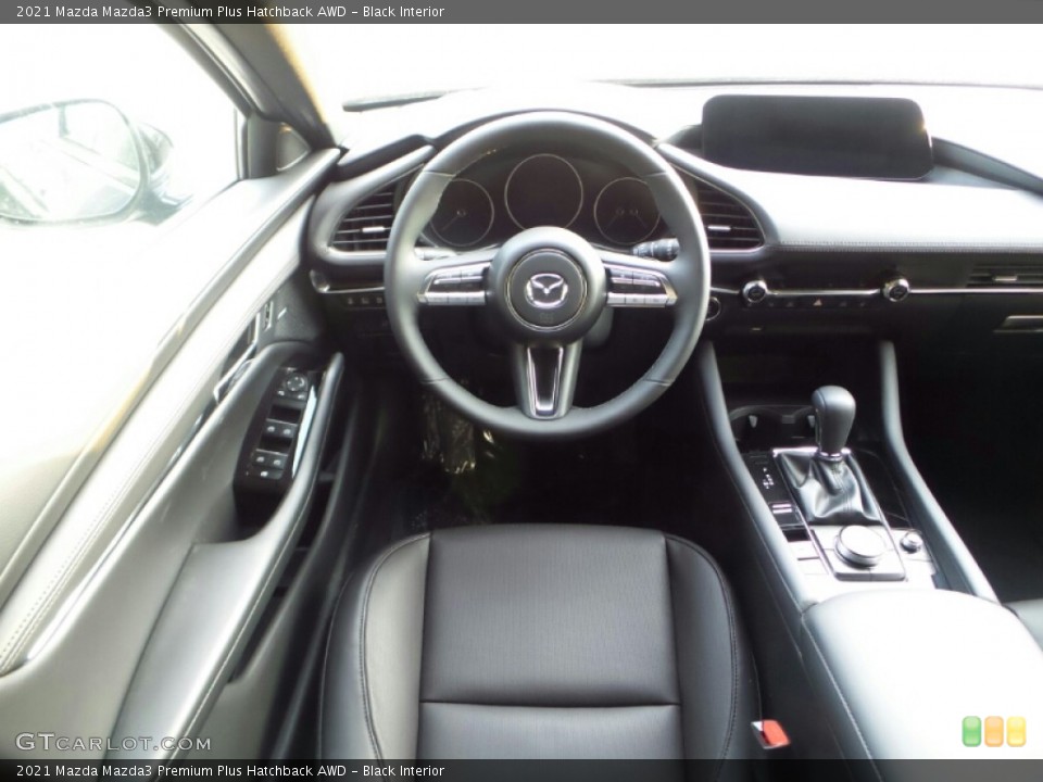Black Interior Dashboard for the 2021 Mazda Mazda3 Premium Plus Hatchback AWD #140759593