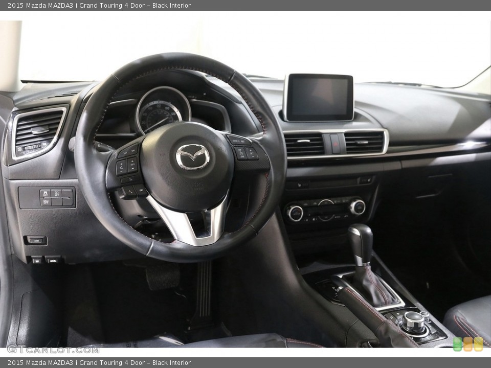 Black Interior Dashboard for the 2015 Mazda MAZDA3 i Grand Touring 4 Door #140785544