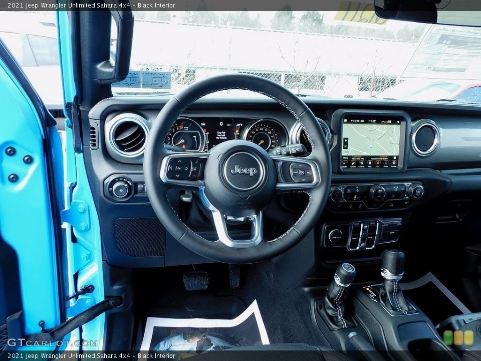 Black Interior Dashboard for the 2021 Jeep Wrangler Unlimited Sahara 4x4 #140809941
