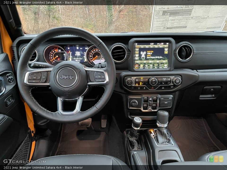 Black Interior Dashboard for the 2021 Jeep Wrangler Unlimited Sahara 4x4 #140827376