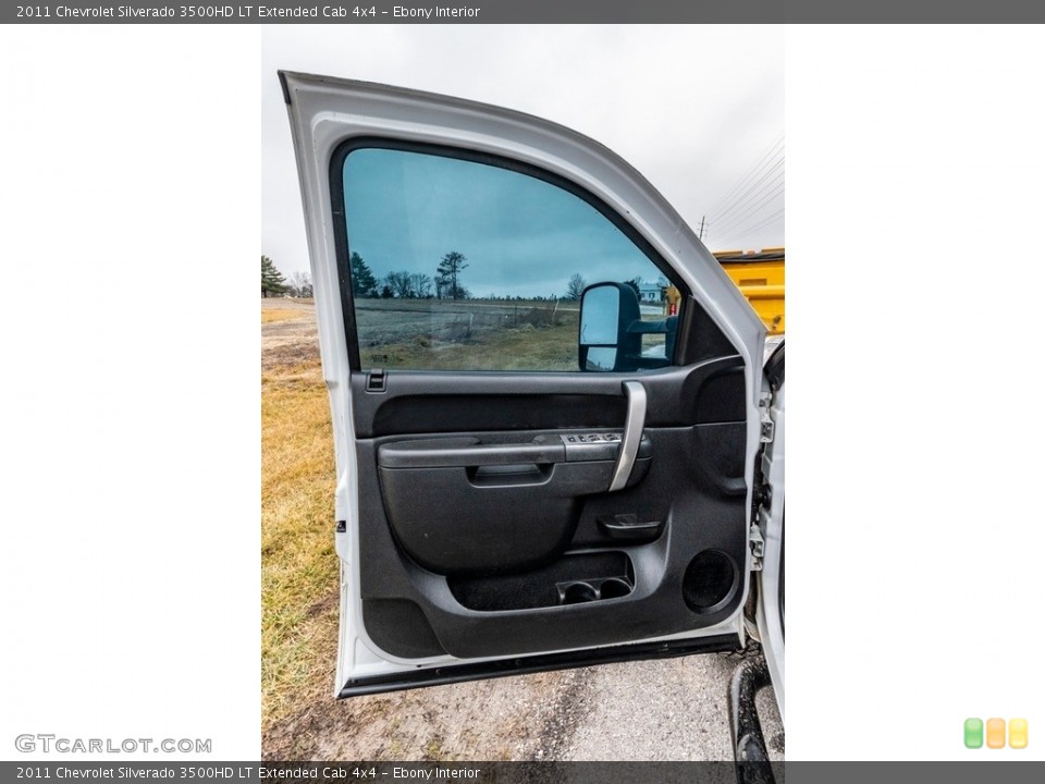 Ebony Interior Door Panel for the 2011 Chevrolet Silverado 3500HD LT Extended Cab 4x4 #140866143