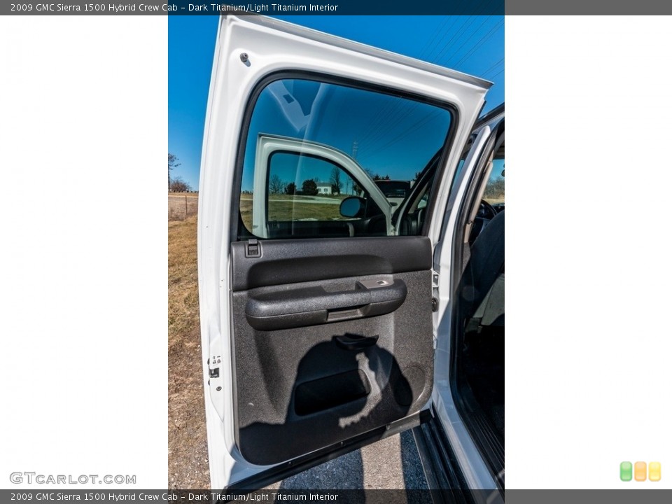 Dark Titanium/Light Titanium Interior Door Panel for the 2009 GMC Sierra 1500 Hybrid Crew Cab #140907074
