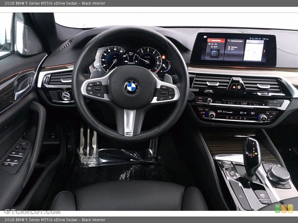 Black Interior Dashboard for the 2018 BMW 5 Series M550i xDrive Sedan #141012002