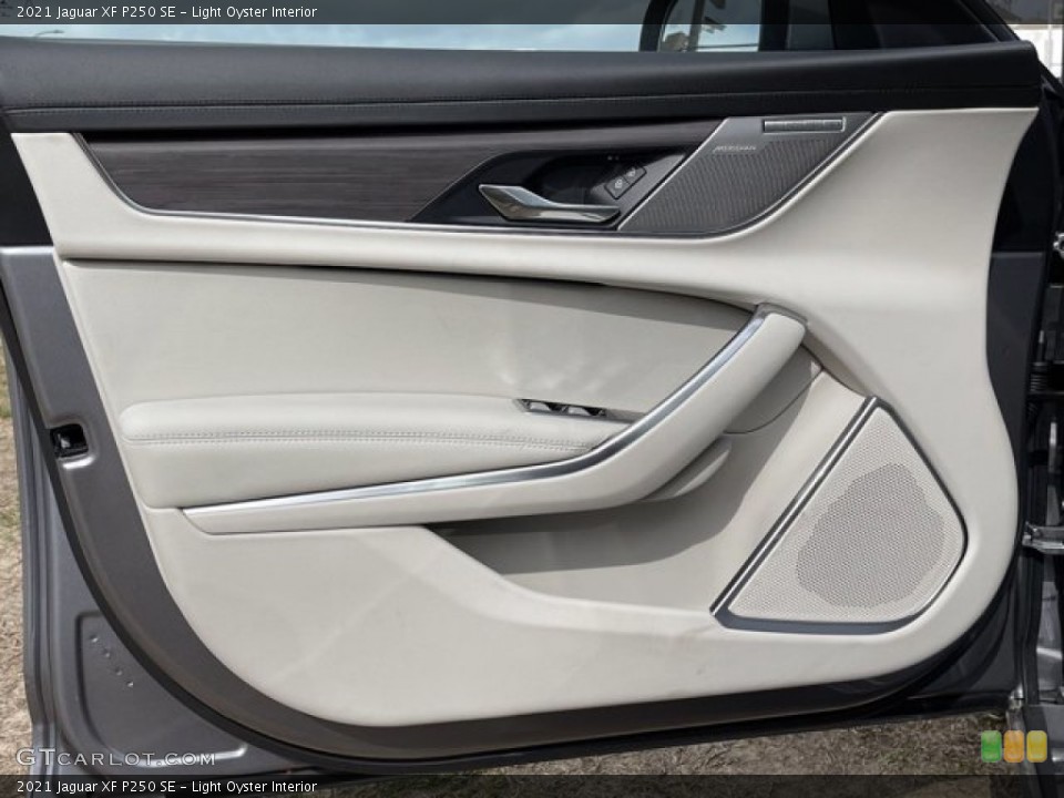 Light Oyster Interior Door Panel for the 2021 Jaguar XF P250 SE #141031070