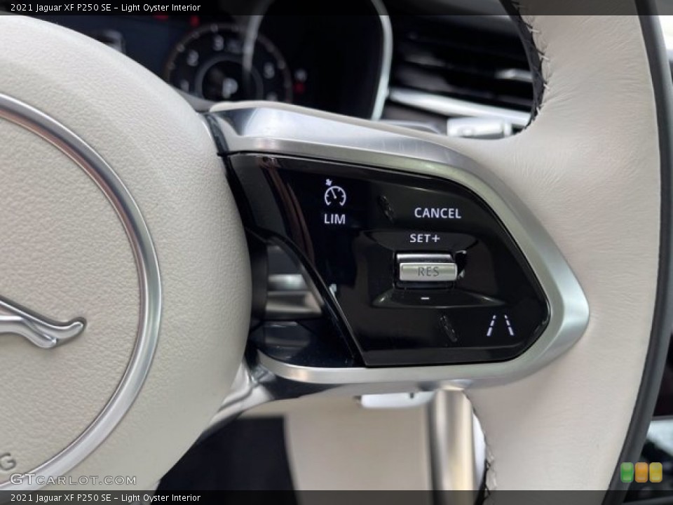 Light Oyster Interior Steering Wheel for the 2021 Jaguar XF P250 SE #141031166