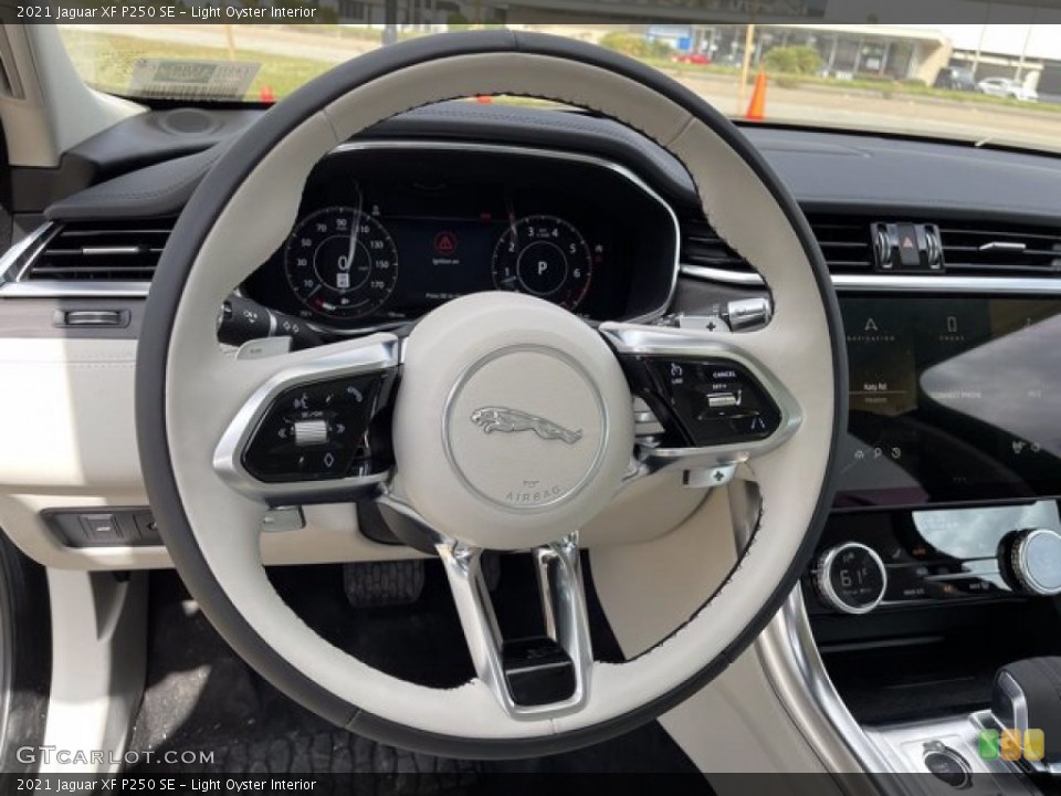 Light Oyster Interior Steering Wheel for the 2021 Jaguar XF P250 SE #141031190