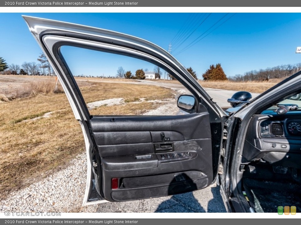 Medium Light Stone Interior Door Panel for the 2010 Ford Crown Victoria Police Interceptor #141039242