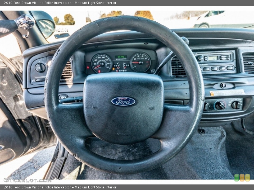 Medium Light Stone Interior Steering Wheel for the 2010 Ford Crown Victoria Police Interceptor #141039488