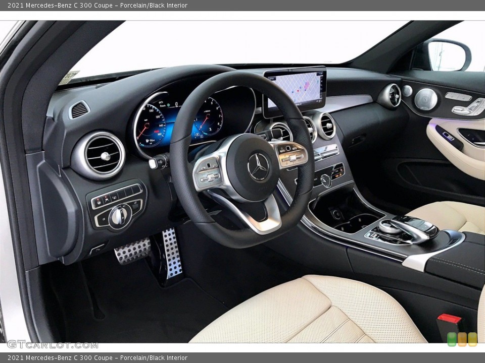 Porcelain/Black Interior Dashboard for the 2021 Mercedes-Benz C 300 Coupe #141112109