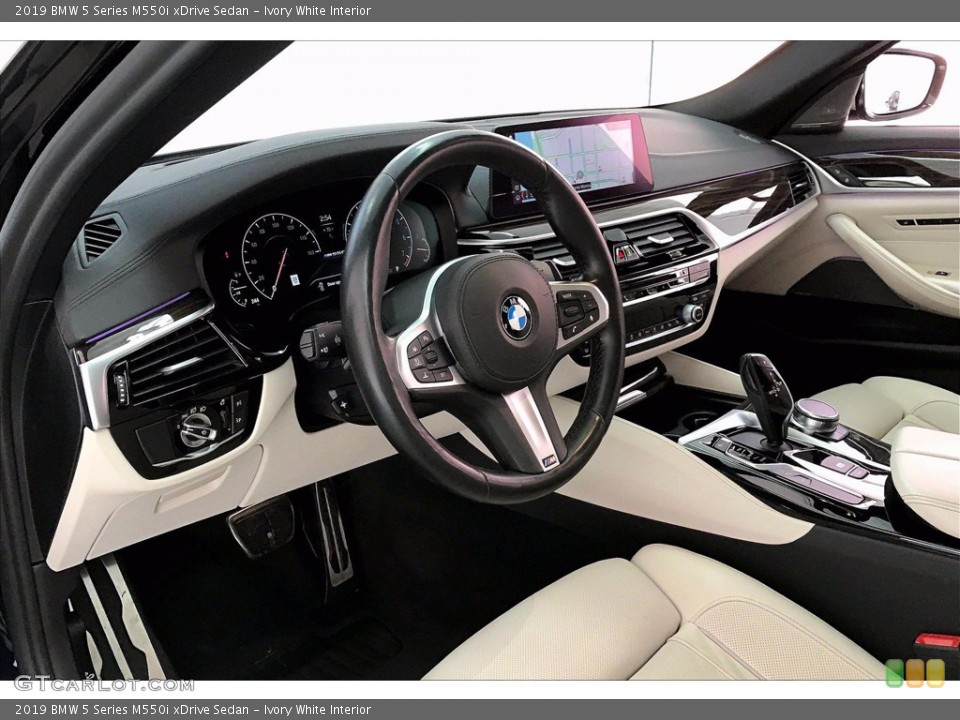 Ivory White Interior Photo for the 2019 BMW 5 Series M550i xDrive Sedan #141216383