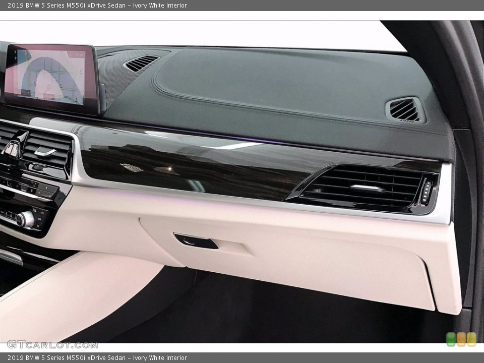 Ivory White Interior Dashboard for the 2019 BMW 5 Series M550i xDrive Sedan #141216437