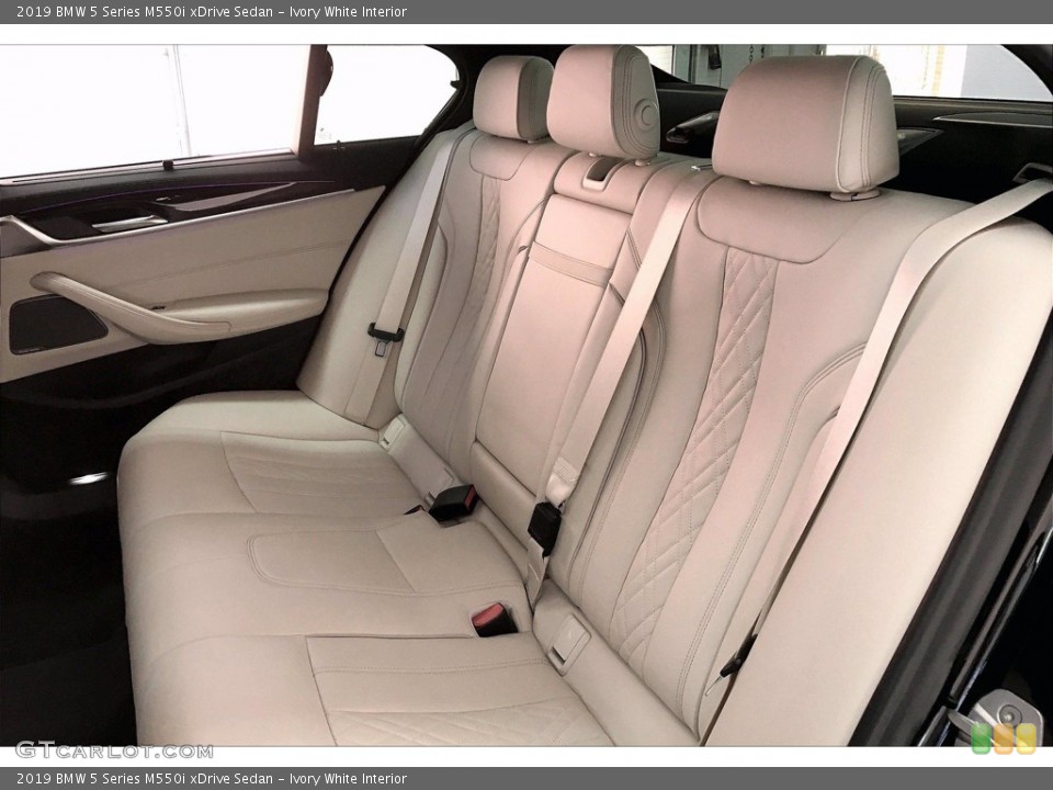 Ivory White Interior Rear Seat for the 2019 BMW 5 Series M550i xDrive Sedan #141216538