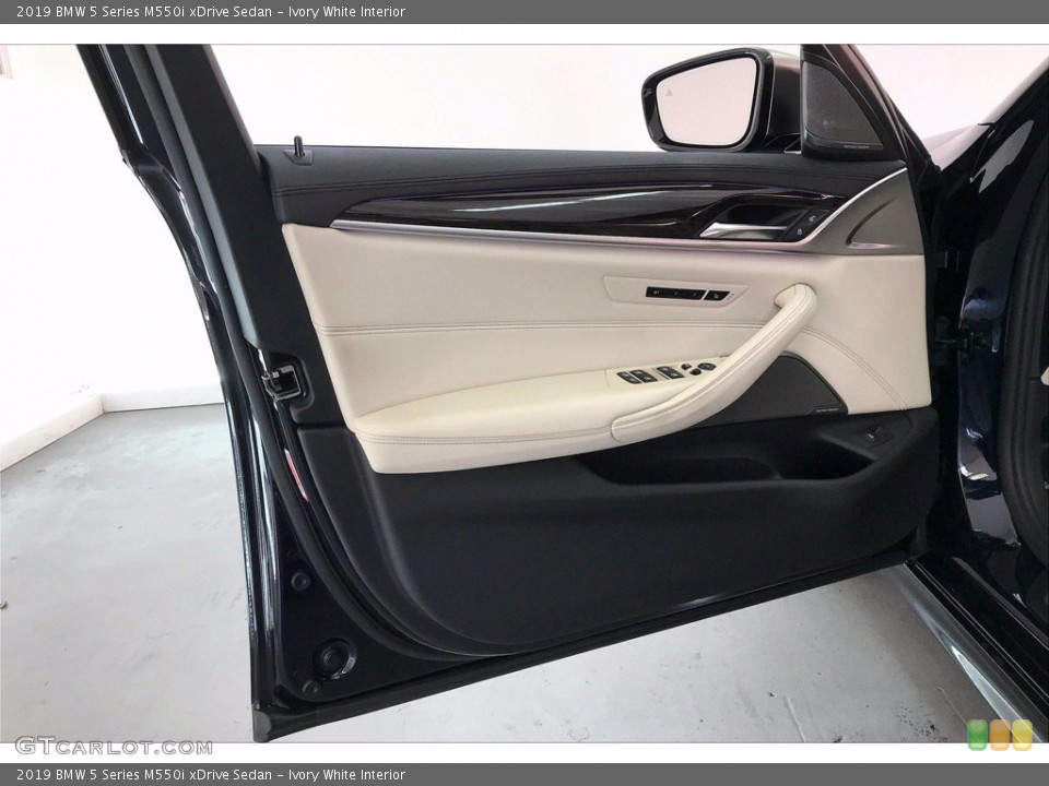 Ivory White Interior Door Panel for the 2019 BMW 5 Series M550i xDrive Sedan #141216691