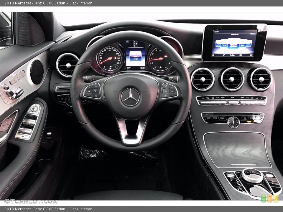 Black Interior Dashboard for the 2018 Mercedes-Benz C 300 Sedan #141229537
