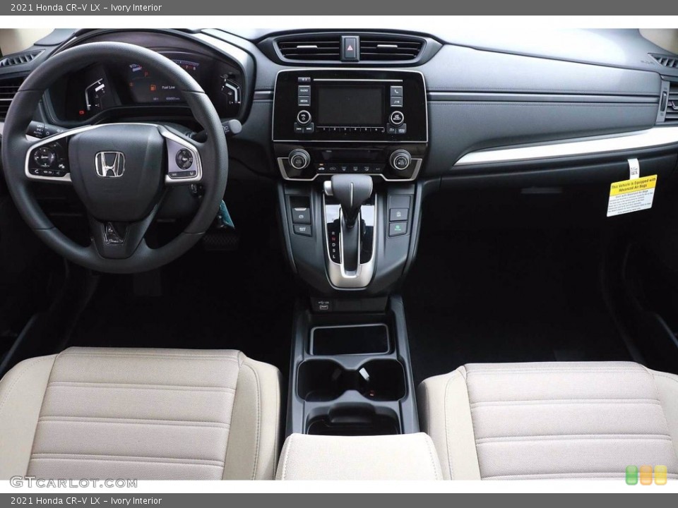 Ivory Interior Dashboard for the 2021 Honda CR-V LX #141254130