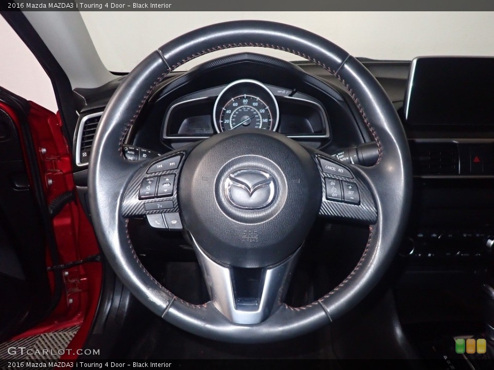 Black Interior Steering Wheel for the 2016 Mazda MAZDA3 i Touring 4 Door #141274764