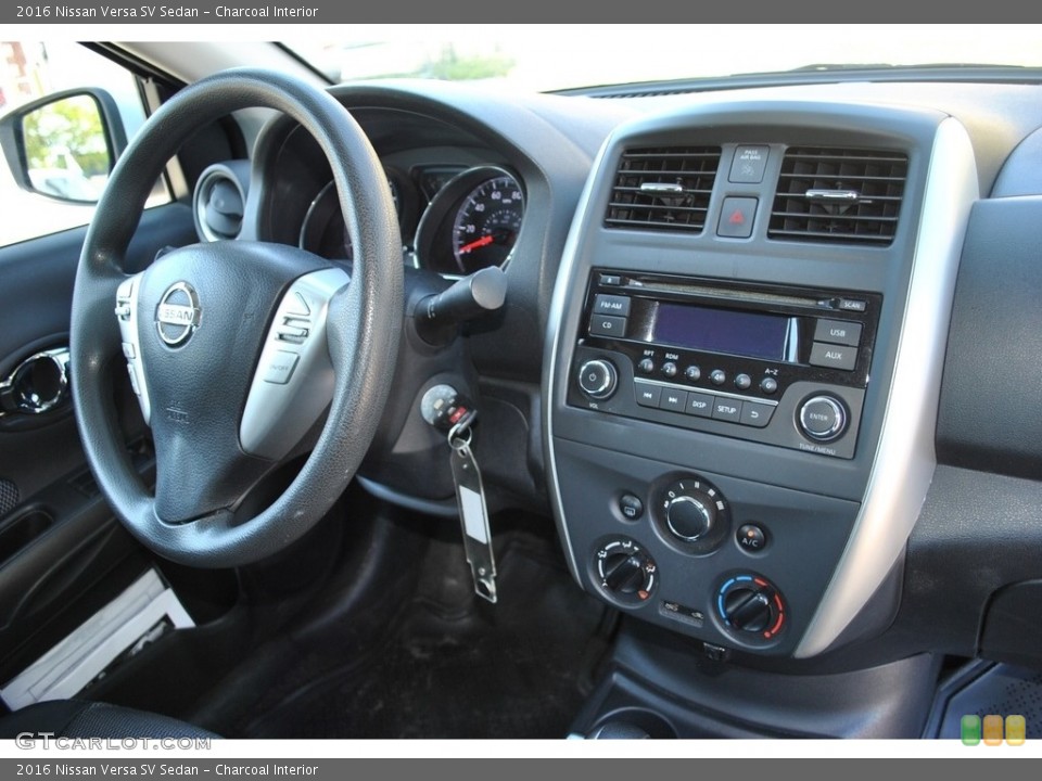 Charcoal Interior Controls for the 2016 Nissan Versa SV Sedan #141293506