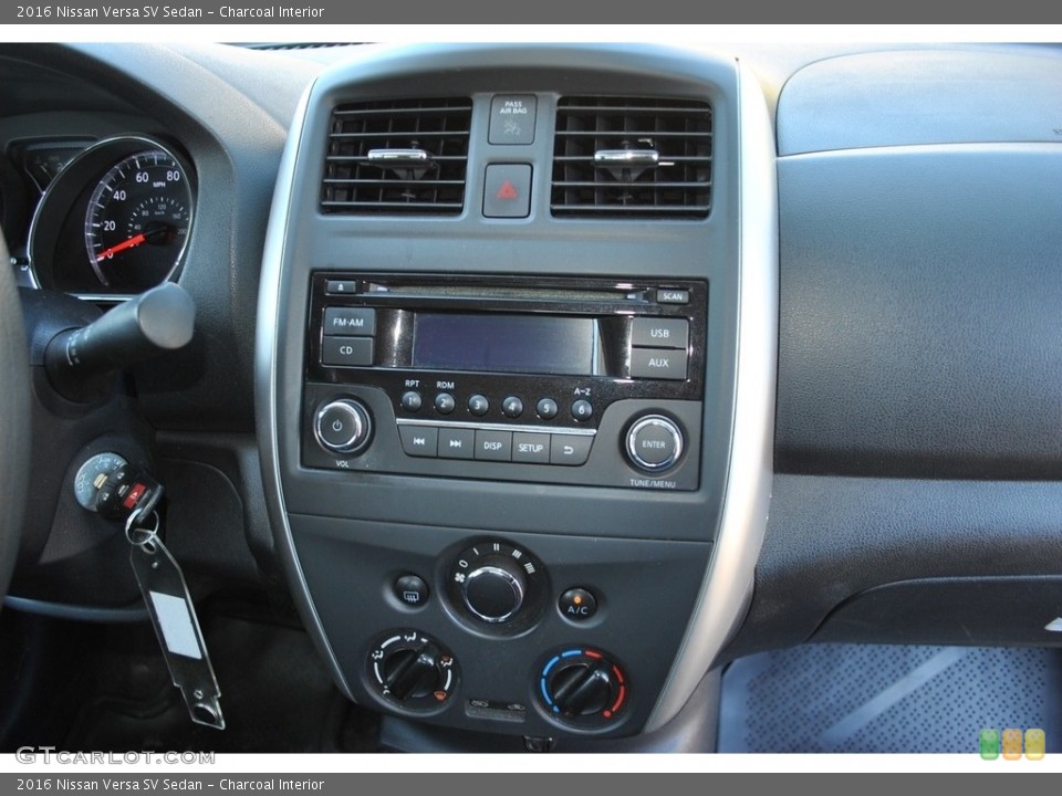 Charcoal Interior Controls for the 2016 Nissan Versa SV Sedan #141293551