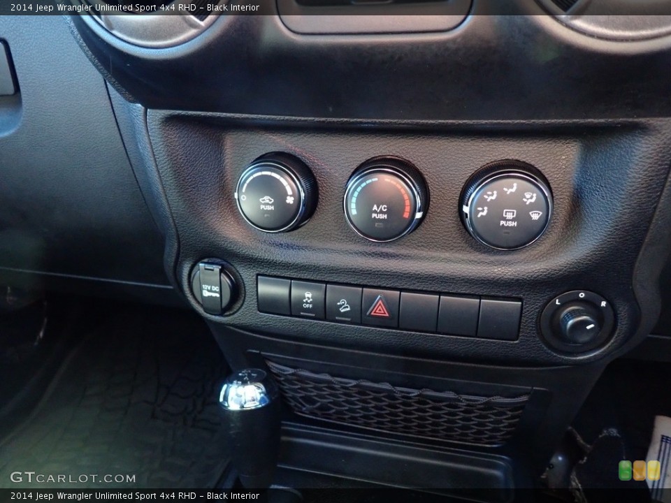 Black Interior Controls for the 2014 Jeep Wrangler Unlimited Sport 4x4 RHD #141294007