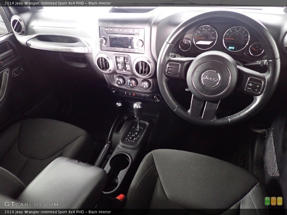 Black Interior Dashboard for the 2014 Jeep Wrangler Unlimited Sport 4x4 RHD #141294220