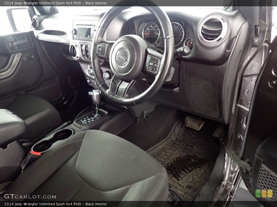 Black Interior Steering Wheel for the 2014 Jeep Wrangler Unlimited Sport 4x4 RHD #141294292
