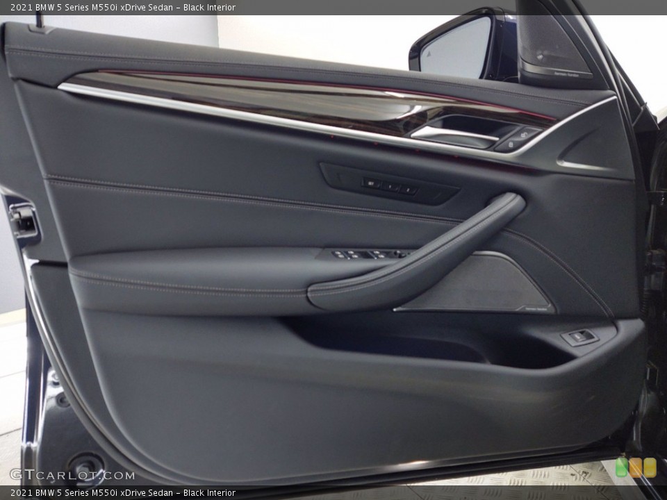 Black Interior Door Panel for the 2021 BMW 5 Series M550i xDrive Sedan #141417622