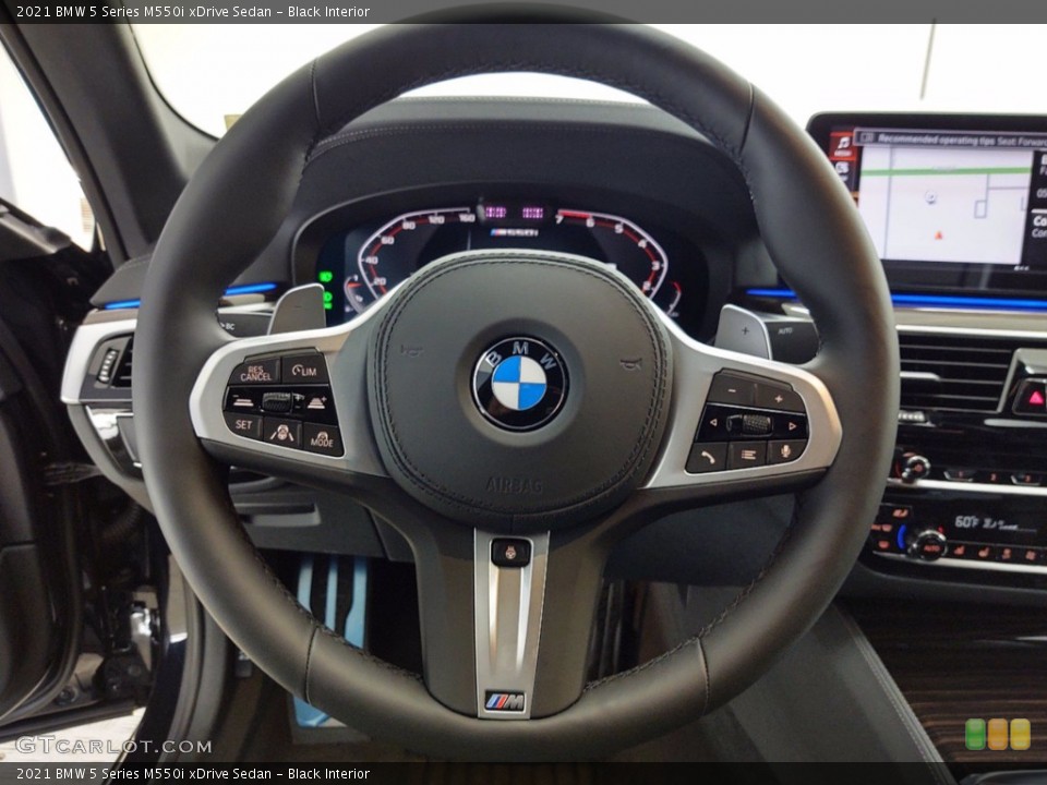 Black Interior Steering Wheel for the 2021 BMW 5 Series M550i xDrive Sedan #141417719