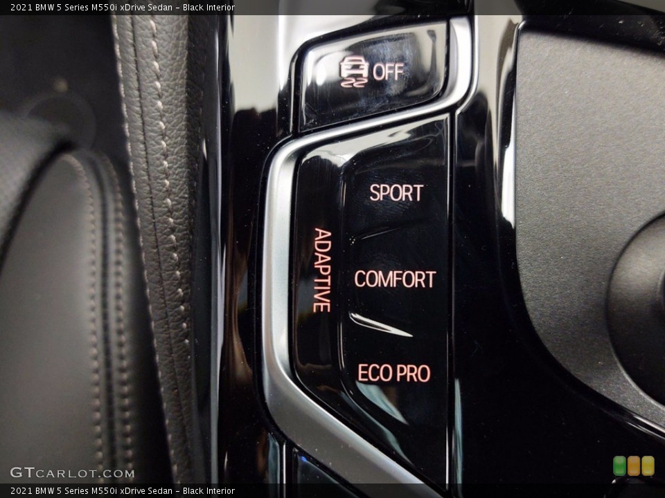 Black Interior Controls for the 2021 BMW 5 Series M550i xDrive Sedan #141417944