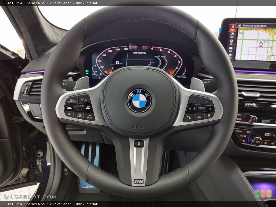 Black Interior Steering Wheel for the 2021 BMW 5 Series M550i xDrive Sedan #141433930