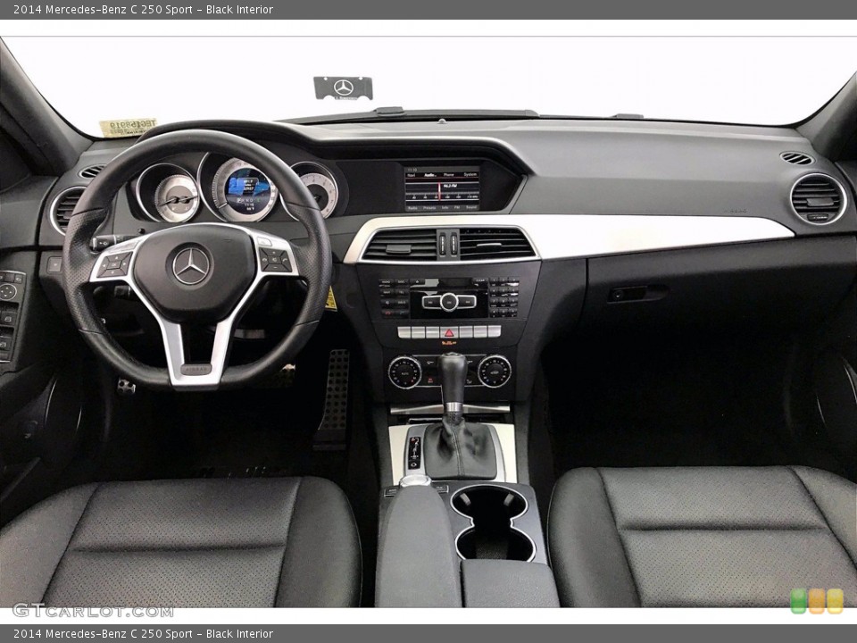 Black Interior Dashboard for the 2014 Mercedes-Benz C 250 Sport #141528437