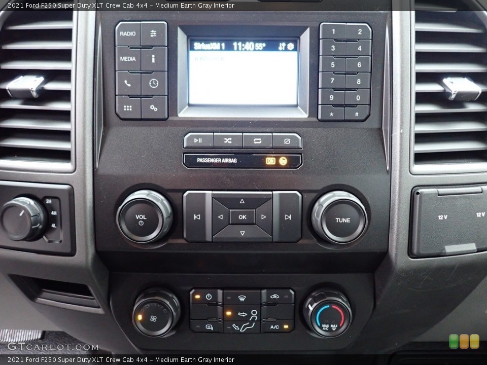 Medium Earth Gray Interior Controls for the 2021 Ford F250 Super Duty XLT Crew Cab 4x4 #141553698