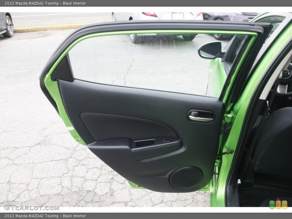Black Interior Door Panel for the 2013 Mazda MAZDA2 Touring #141556167
