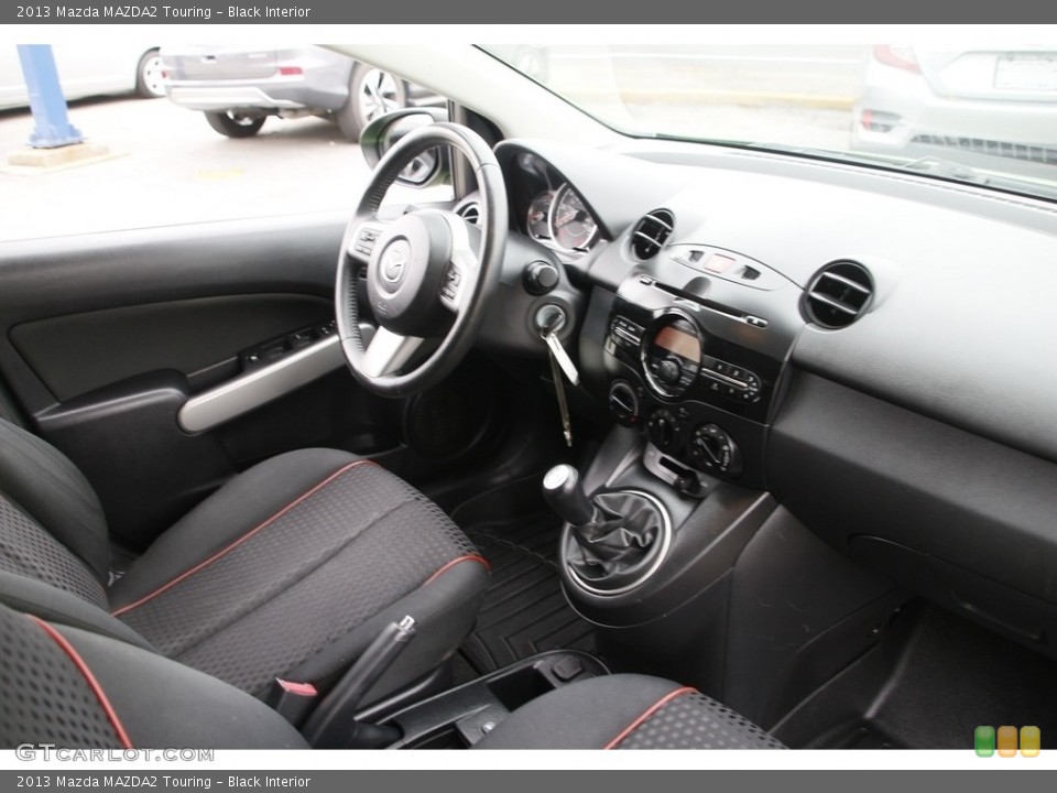 Black Interior Dashboard for the 2013 Mazda MAZDA2 Touring #141556230