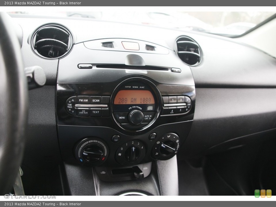 Black Interior Controls for the 2013 Mazda MAZDA2 Touring #141556293
