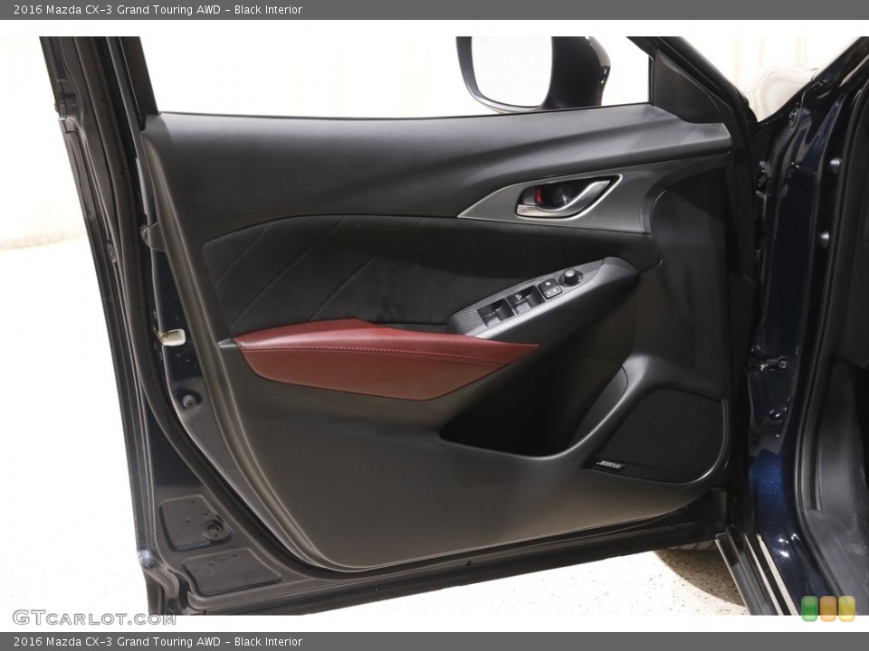 Black Interior Door Panel for the 2016 Mazda CX-3 Grand Touring AWD #141614131
