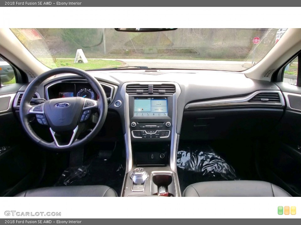 Ebony Interior Dashboard for the 2018 Ford Fusion SE AWD #141652891