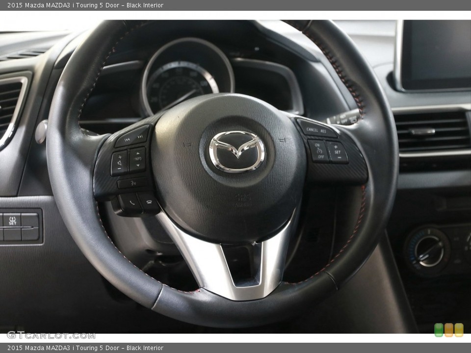 Black Interior Steering Wheel for the 2015 Mazda MAZDA3 i Touring 5 Door #141666558