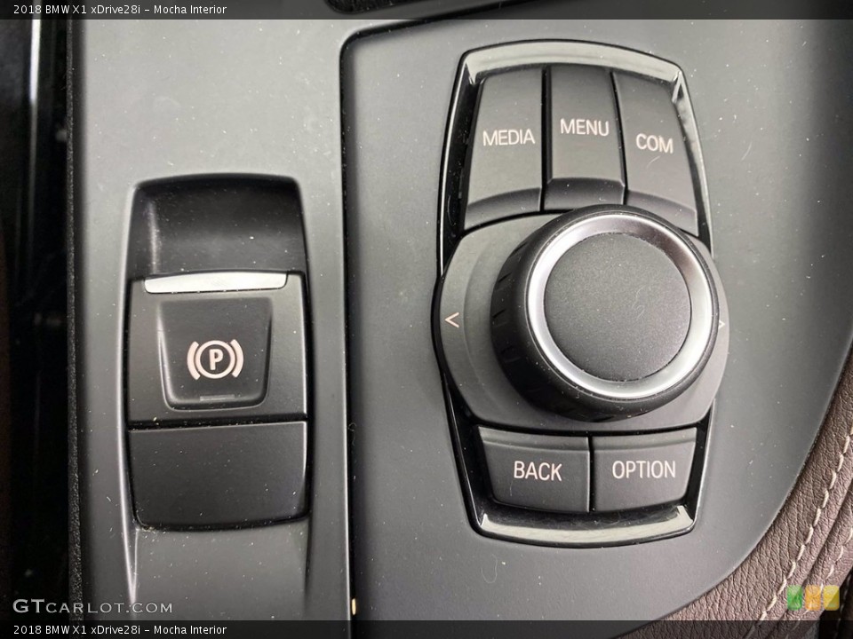 Mocha Interior Controls for the 2018 BMW X1 xDrive28i #141688980