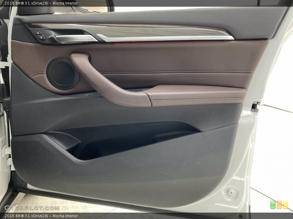 Mocha Interior Door Panel for the 2018 BMW X1 xDrive28i #141688998