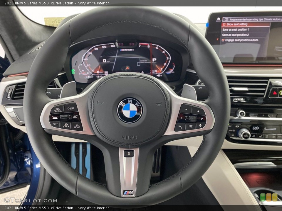 Ivory White Interior Steering Wheel for the 2021 BMW 5 Series M550i xDrive Sedan #141786399