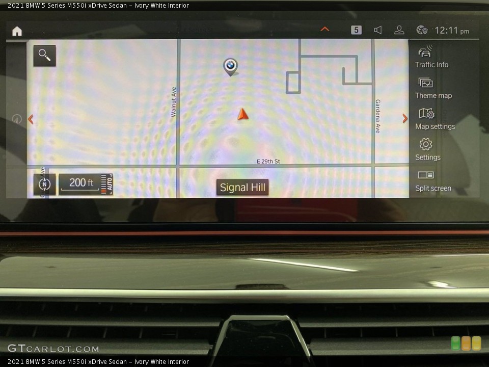 Ivory White Interior Navigation for the 2021 BMW 5 Series M550i xDrive Sedan #141786449