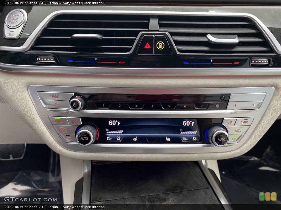 Ivory White/Black Interior Controls for the 2022 BMW 7 Series 740i Sedan #141811570