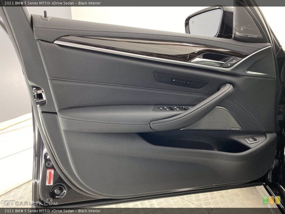 Black Interior Door Panel for the 2021 BMW 5 Series M550i xDrive Sedan #141812002